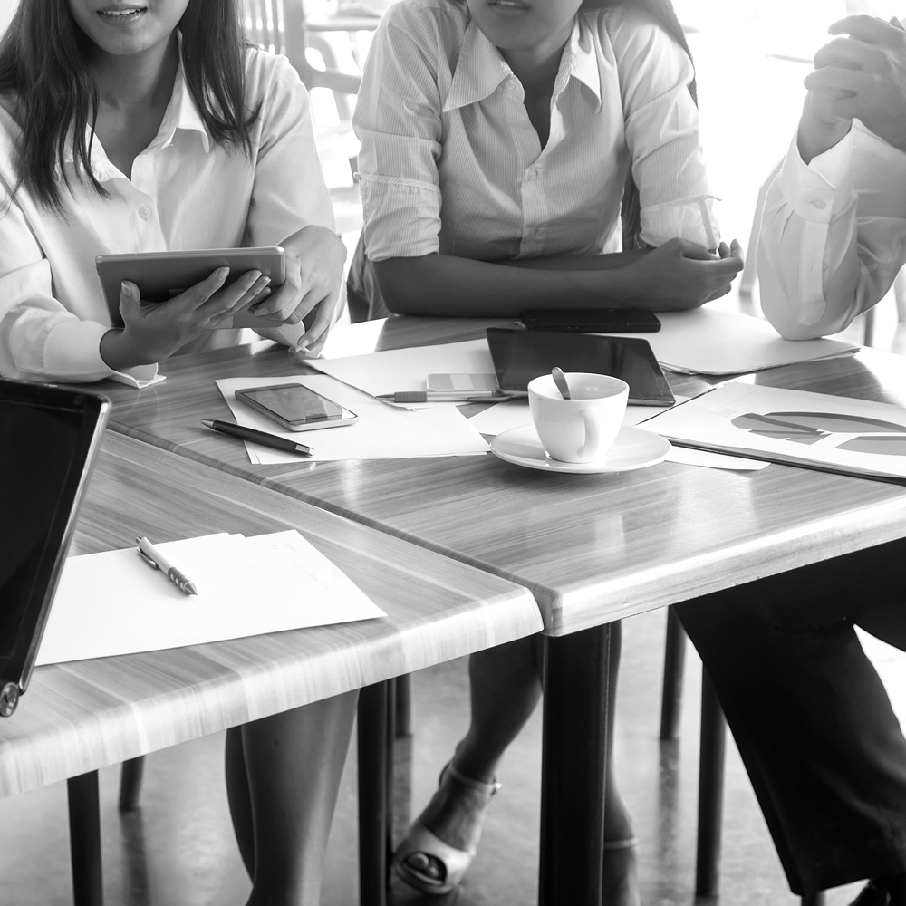 Photo of people having a working lunch